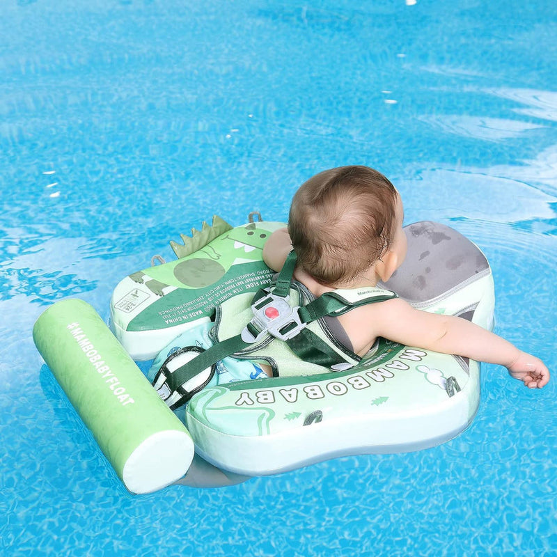 Baby lying in the Mambobaby Dinosaur float in a pool