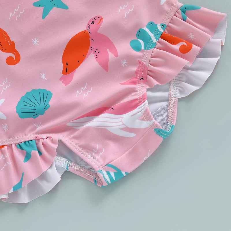 Close-up of baby swimsuit fabric and ruffle