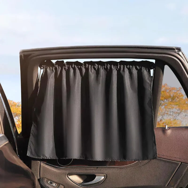 Car window sun shade fitted on a rear side window