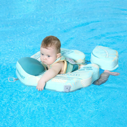 Baby practicing breaststroke and tummy time in the Mambobaby Seashell Float safety trainer.